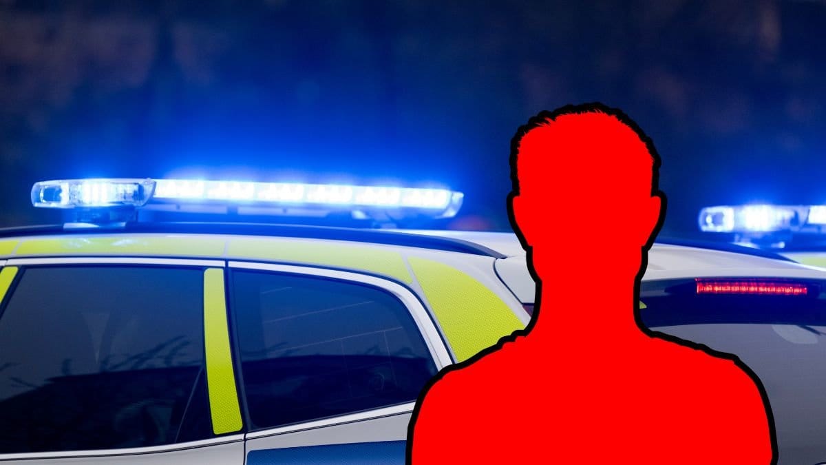 Polisbil och siluett av en man. 