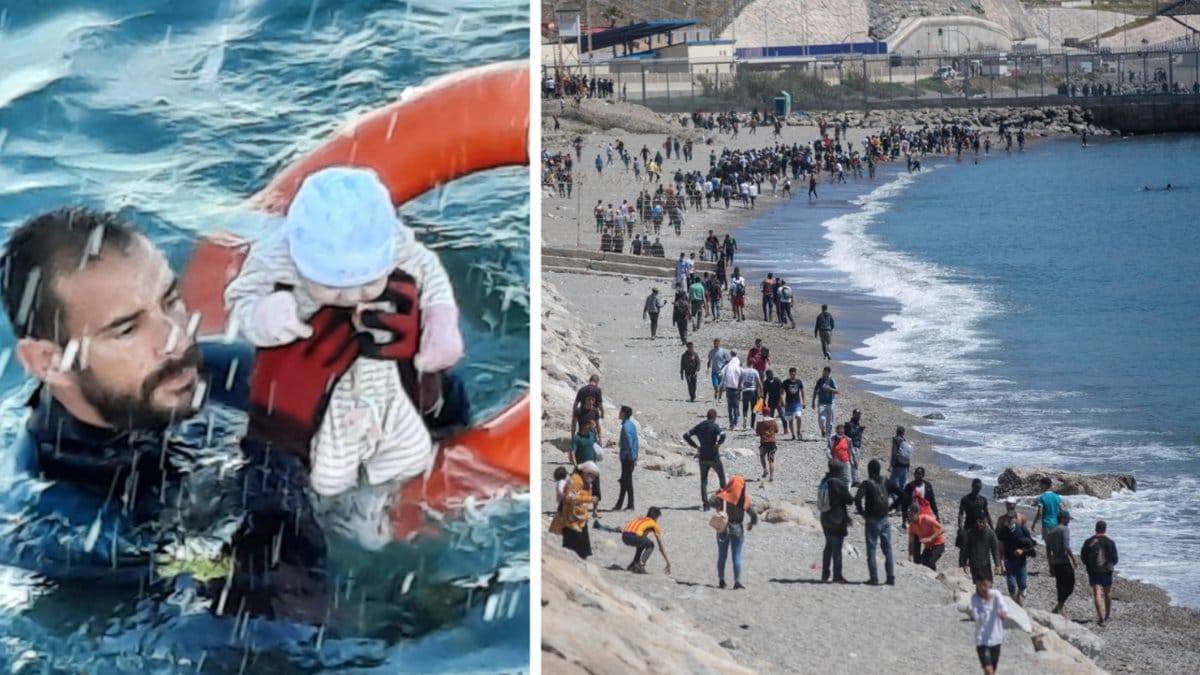 Sjöräddaren drar upp spädbarnet ur vågorna och migranter på stranden.