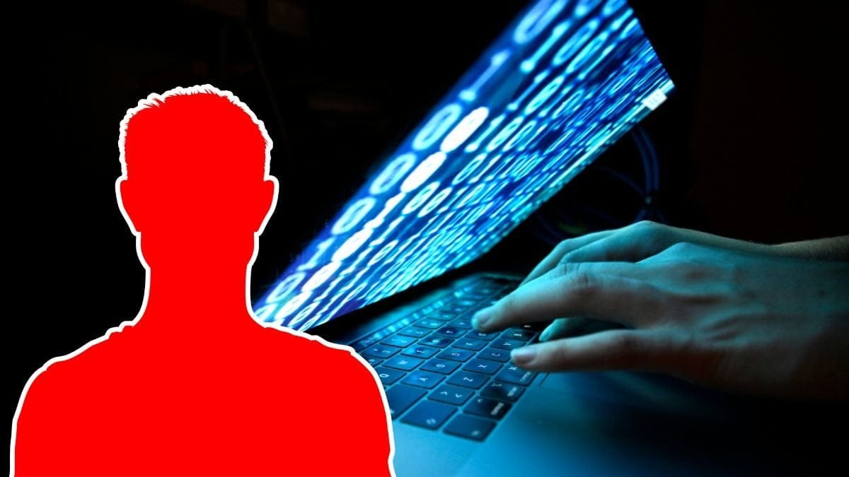 Siluett av en man och en dator.