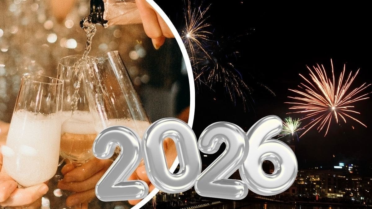 Skål med champagneglas och fyrverkerier