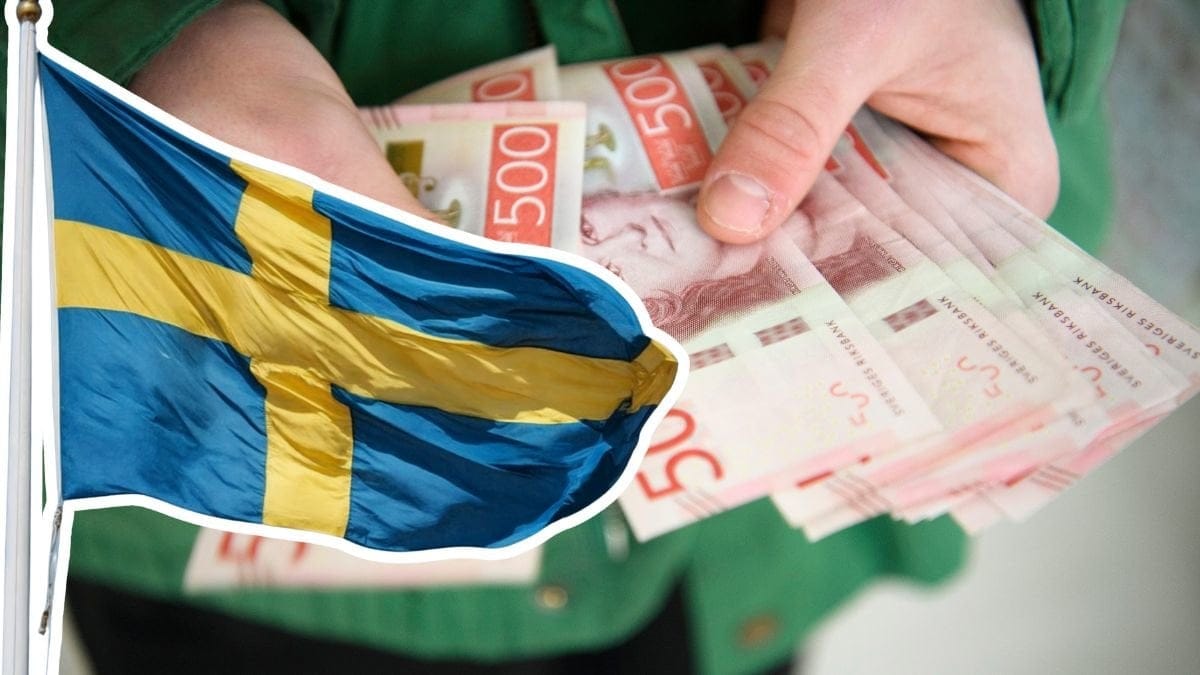 Svenska flaggan och femhundralappar.