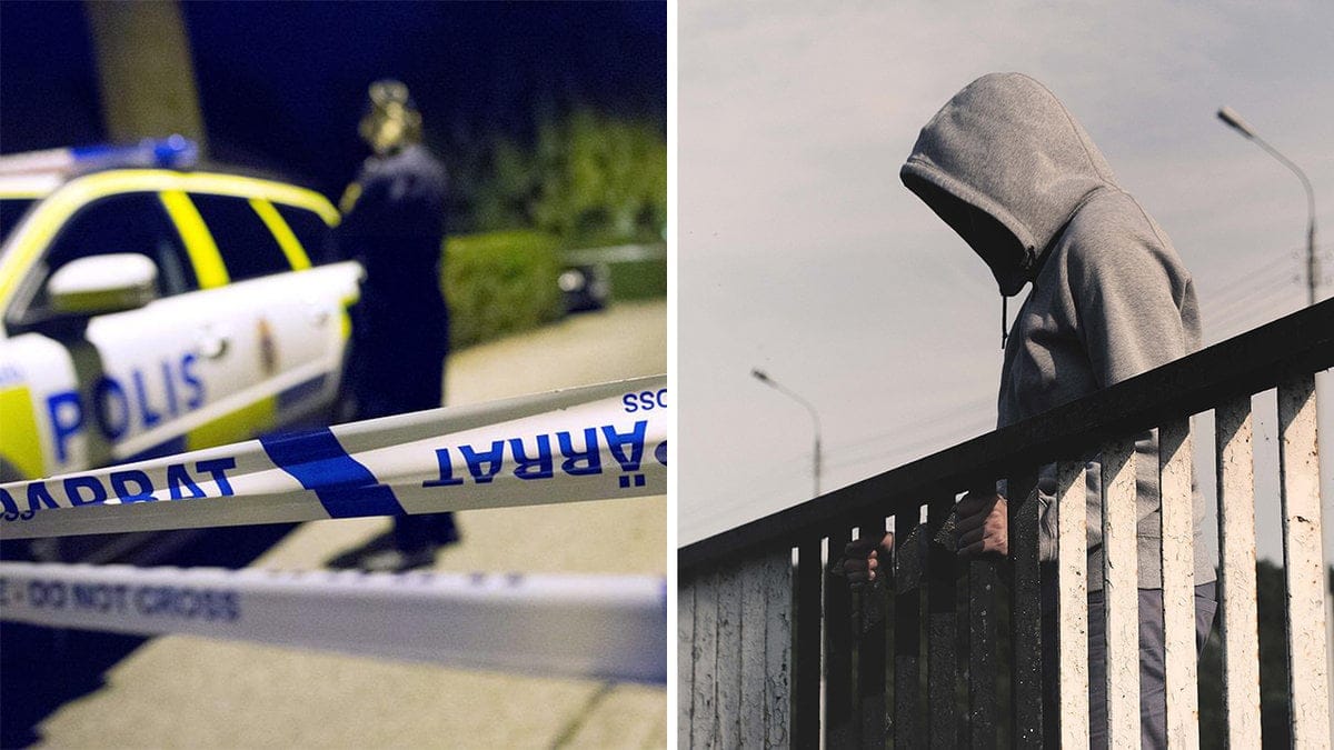 en polisbil och band, en man i grå huva håller i ett staket