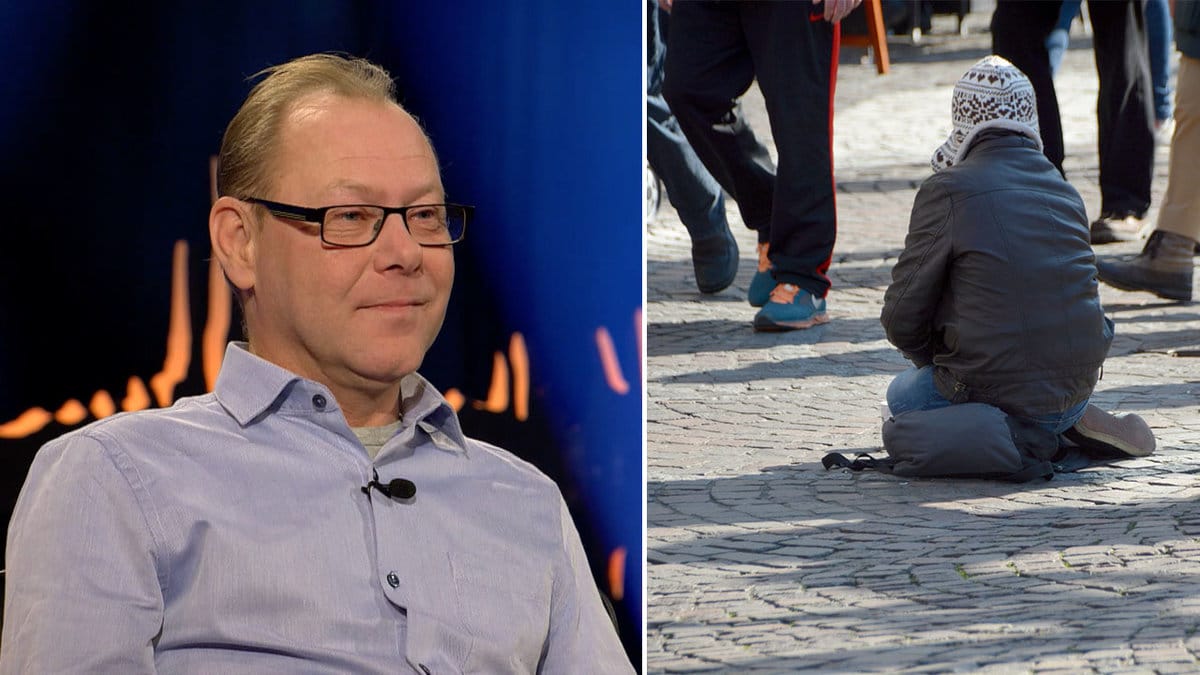Man i blå skjorta, person sitter ner på gatan